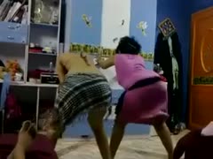 On a webcam, two lusty Arab women shake their enormous buttocks.